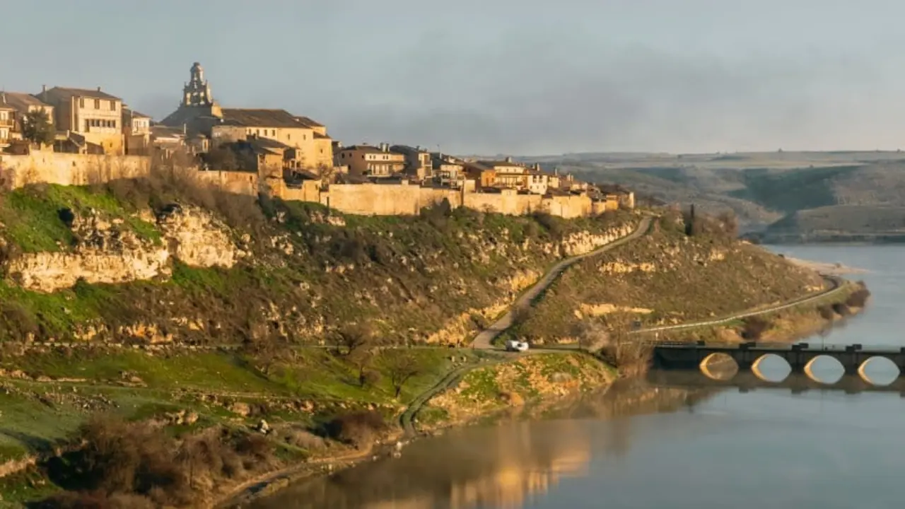 Maderuelo village and bridge over Linares del Arroyo reservoir. Segovia. Spain. Europe.