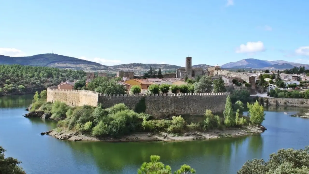 Panoramic of the meander of river Lozoya and the town and fortress of Buitrago de Lozoya in Madrid (Spain).