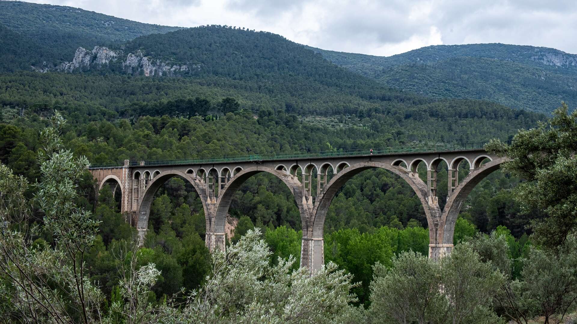 http://www.dreamstime.com/royalty-free-stock-photography-stunning-bridge-puente-de-las-siete-lunas-architecture-gracefully-connects-urban-natural-environments-featuring-elegant-arches-image402904537